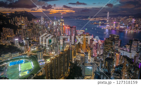 June 10 2025 View of a Vibrant Cityscape at Sunset Over the Harbor June 10 2025 View of a Vibrant Cityscape at Sunset Over the Harbor 127318159
