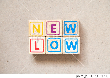 Alphabet letter block in word new low on wood background 127319144