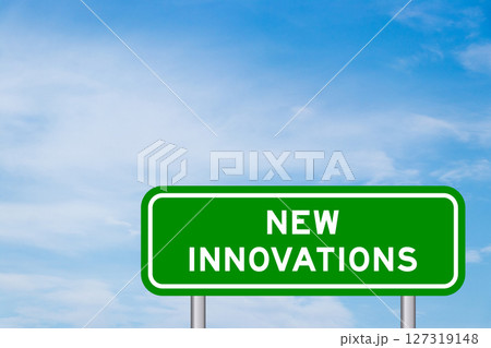 Green color transportation sign with word new innovations on blue sky with white cloud background Green color transportation sign with word new innovations on blue sky with white cloud background 127319148