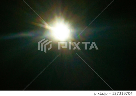 Sun flare on the black background 127319704