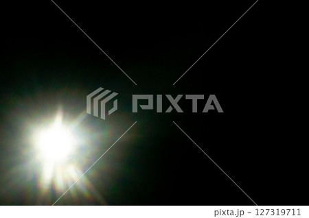 Sun flare on the black background 127319711