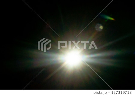Sun flare on the black background 127319718