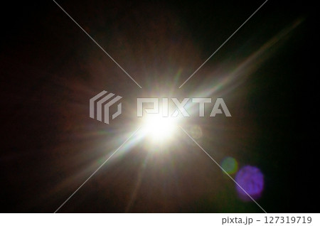 Sun flare on the black background 127319719