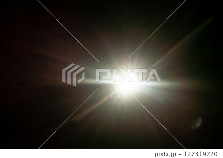 Sun flare on the black background 127319720