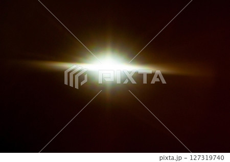 Sun flare on the black background Sun flare on the black background 127319740