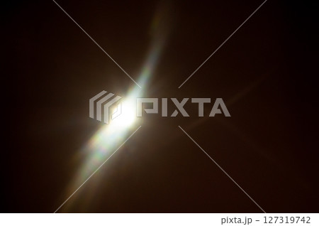 Sun flare on the black background 127319742
