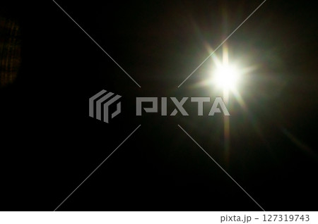 Sun flare on the black background Sun flare on the black background 127319743