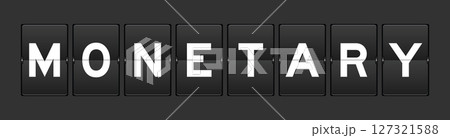 Black color analog flip board with word monetary on gray background Black color analog flip board with word monetary on gray background 127321588