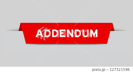 Red color inserted label with word addendum on gray background Red color inserted label with word addendum on gray background 127321596