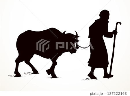 Vector drawing. A man leads an ox 127322168