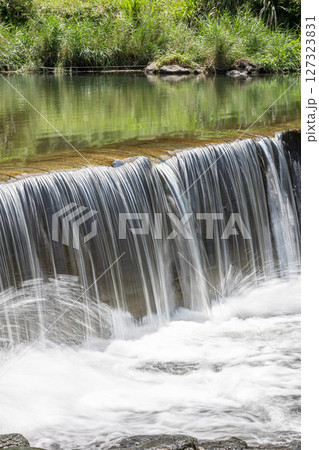 小さい滝の素材写真 鹿児島県姶良市の金山橋の風景 小さい滝の素材写真 鹿児島県姶良市の金山橋の風景 127323831
