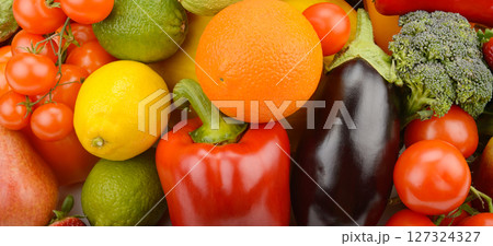 Assorted fresh ripe fruits and vegetables. Food concept background. Assorted fresh ripe fruits and vegetables. Food concept background. 127324327