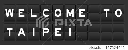 Black color analog flip board with word welcome to taipei on gray background 127324642