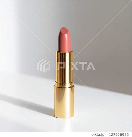 Nude Pink Lipstick in Gold Tube on White Background 127326986