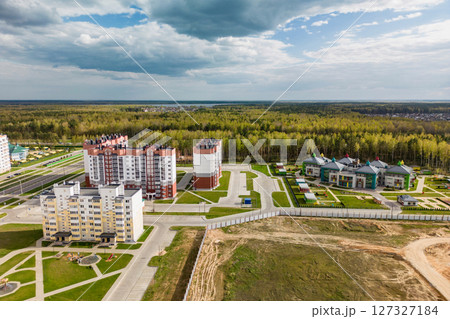 Cityscape of a residential area with modern apartment buildings, new green urban landscape in the city. Modern architectural building of the city. Mortgage. 127327184