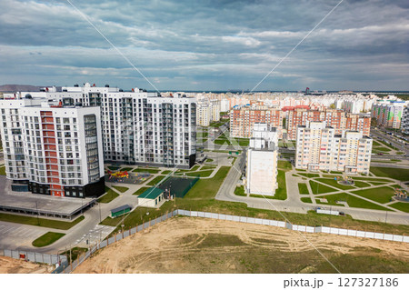 Cityscape of a residential area with modern apartment buildings, new green urban landscape in the city. Modern architectural building of the city. Mortgage. 127327186