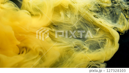 Mist wave. Fog ink swirl. Yellow paint blending in art defocused fluid. Stream color pigment curl explosion abstract black background. 127328103