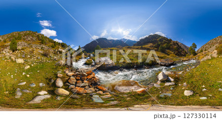 Spherical HDRi panorama of small rustic wooden bridge crossing a mountain stream on sunny autumn day 127330114