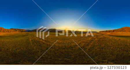 Spherical HDRi panorama of straw field surrounded with foothills at autumn sunset Spherical HDRi panorama of straw field surrounded with foothills at autumn sunset 127330123