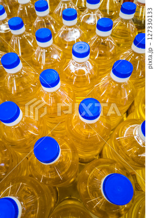 stack of bottles with sunflower seed oil stack of bottles with sunflower seed oil 127330133
