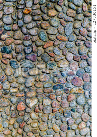 Round cobblestone decorated wall 127330151