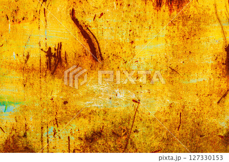 Yellow metal with rust and blue remnants Yellow metal with rust and blue remnants 127330153