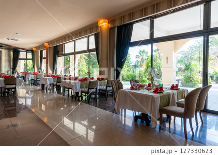 Interior of an empty hotel restaurant 127330623