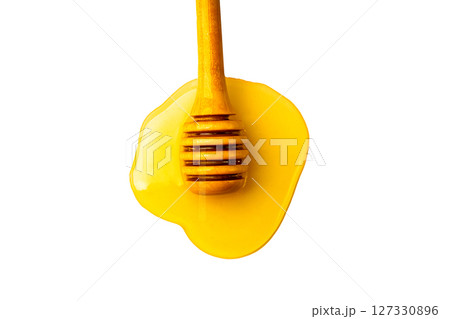 Isolated Honey bee in glass jar and with honey dipper on white background Isolated Honey bee in glass jar and with honey dipper on white background 127330896