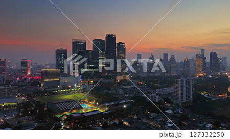 Illuminated skyscrapers and Lumpini park in Bangkok Illuminated skyscrapers and Lumpini park in Bangkok 127332250
