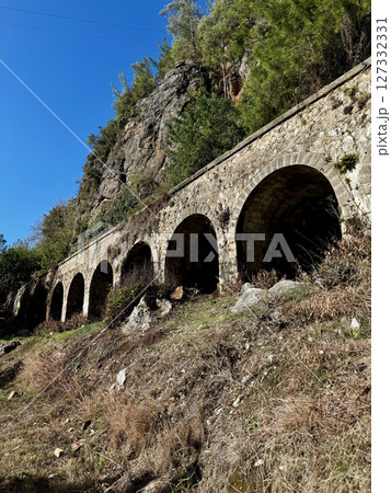 ancient water supply arches architecture mountains autumn. High quality photo 127332331