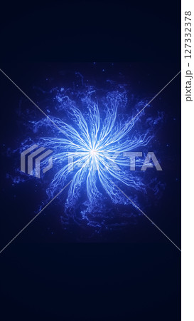 Blue glowing energy burst forming a symmetrical radial explosion with electric tendrils on dark background 127332378