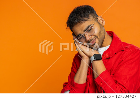 Tired exhausted Indian Arabian man, lazy bored lack of sleep, falling asleep, take a break, relax Tired exhausted Indian Arabian man, lazy bored lack of sleep, falling asleep, take a break, relax 127334427
