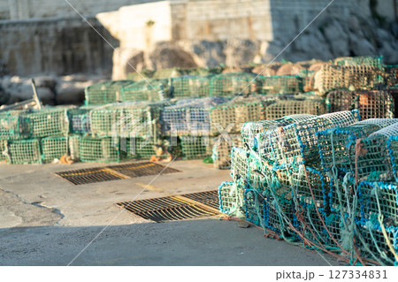 Crab Traps Stacked on Dock Ready for the Upcoming Crab Traps Stacked on Dock Ready for the Upcoming 127334831