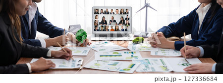 Business people on video conference for brisk virtual group meeting Business people on video conference for brisk virtual group meeting 127336684