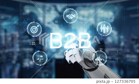 Futuristic Business-to-Business Concept with Robot Hand Showing B2B Collaboration and Digital Technology in Modern Office Environment. Auvana Futuristic Business-to-Business Concept with Robot Hand Showing B2B Collaboration and Digital Technology in Modern Office Environment. Auvana 127336705