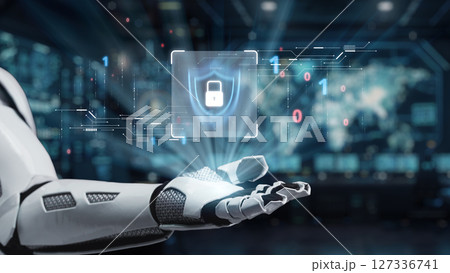 Futuristic Robot Hand Projecting Digital Security Shield Icon on Background of Data and Technology Interface in Modern Cybersecurity Concept. Auvana 127336741