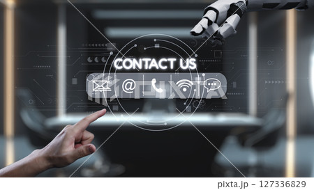 Futuristic Technology Interaction with Hand and Robot Arm for Contact Us Interface in Modern Office Setting. Auvana Futuristic Technology Interaction with Hand and Robot Arm for Contact Us Interface in Modern Office Setting. Auvana 127336829