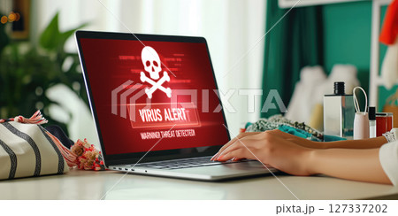 Virus warning alert on computer screen detected brisk cyber threat 127337202