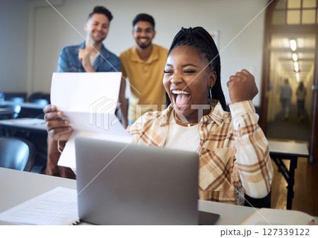 University, black woman or students with scholarship success, reading exam feedback or school loan. Happy, smile or friends for education goals, college test report or achievement letter in classroom University, black woman or students with scholarship success, reading exam feedback or school loan. Happy, smile or friends for education goals, college test report or achievement letter in classroom 127339122