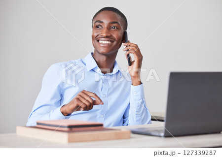 Phone call, happy or black man with success for communication, networking or startup company deal in office building. Smile, laptop or man with smartphone for contact, planning agenda or schedule. 127339287