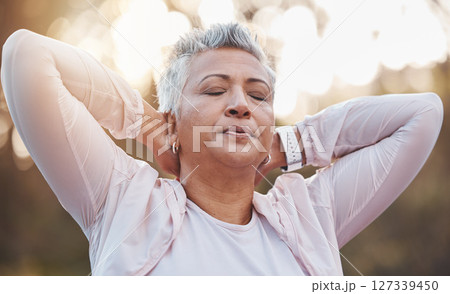Senior woman, breathing and stretching arms outdoor for fitness exercise, runner warm up and workout training. Nature forest, elderly athlete and closed eyes for performance, breathe and body stretch 127339450