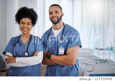 Doctor, portrait smile and arms crossed at hospital with vision for healthcare, phd or cardiology team. Happy medical experts standing in confidence for teamwork, health checkup or medicare at clinic Doctor, portrait smile and arms crossed at hospital with vision for healthcare, phd or cardiology team. Happy medical experts standing in confidence for teamwork, health checkup or medicare at clinic 127339466