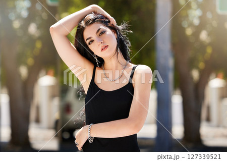 Designer fashion, young woman and outdoor portrait with trendy clothes and edgy style for gen z youth in park. Hair, mockup and beauty with stylish girl and fashion model with freedom and focus. 127339521