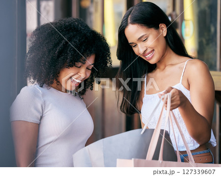 Happy customer, women and friends check shopping bags for luxury fashion, discount product and sales promotion from retail therapy. Two girls excited at choice from shopping mall customer experience 127339607