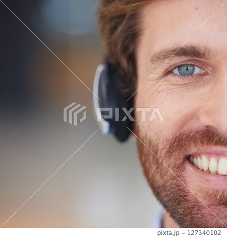 Call center man, closeup and smile in portrait for customer service, happy and focus with headphones. Customer support, crm expert and happiness in zoom of face, eye and telemarketing job in Orlando Call center man, closeup and smile in portrait for customer service, happy and focus with headphones. Customer support, crm expert and happiness in zoom of face, eye and telemarketing job in Orlando 127340102