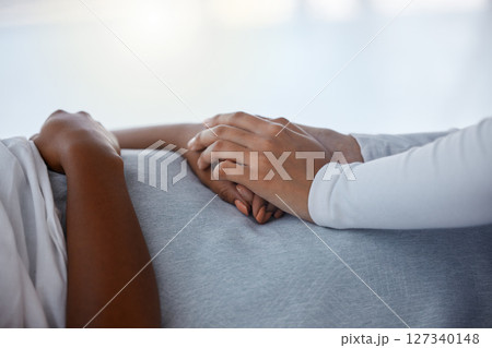 Empathy, support and hands of black family in hospital bed for sickness, virus and help. Comfort, hope and care with friends holding hands in healthcare clinic for surgery, medicine and compassion Empathy, support and hands of black family in hospital bed for sickness, virus and help. Comfort, hope and care with friends holding hands in healthcare clinic for surgery, medicine and compassion 127340148