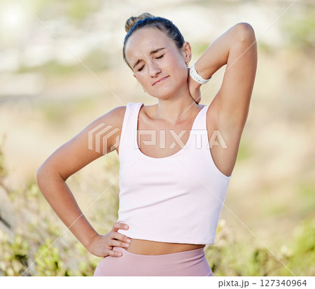 Woman, neck pain or muscle stress in fitness, workout or training in nature park, countryside environment or public garden. Runner, sports athlete or injured personal trainer with body injury crisis 127340964
