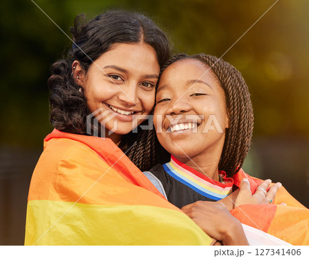Lesbian, couple and women hug, lgbtq relationship with smile together and commitment with flag and pride in portrait. Happy, equality in sexuality and freedom to love, lgbt community and diversity Lesbian, couple and women hug, lgbtq relationship with smile together and commitment with flag and pride in portrait. Happy, equality in sexuality and freedom to love, lgbt community and diversity 127341406