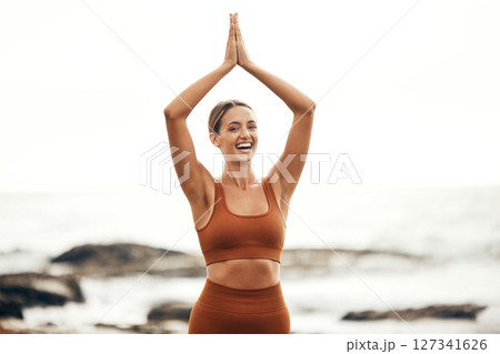 Yoga, balance and woman at the beach with fitness, body and wellness with pilates and zen outdoor in nature. Stretching, chakra and spiritual exercise, ocean and sky mockup, mindfulness and portrait. 127341626
