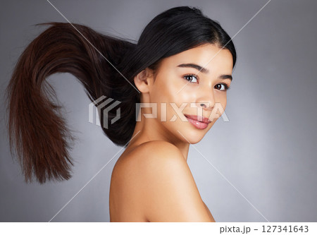 Woman, hair care and beauty in studio portrait for strong, healthy natural shine and wellness by background. Model, hair glow and cosmetic self care for health, self love and confidence by backdrop Woman, hair care and beauty in studio portrait for strong, healthy natural shine and wellness by background. Model, hair glow and cosmetic self care for health, self love and confidence by backdrop 127341643